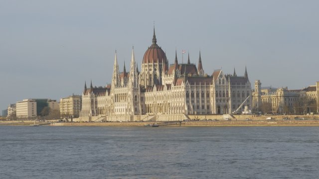 Parliament building of Hungary located on river Danube and city of Budapest by the day 4K 2160p UltraHD footage - Hungarian capital Budapest famous national parliament building 4K 3840X2160 UHD video 