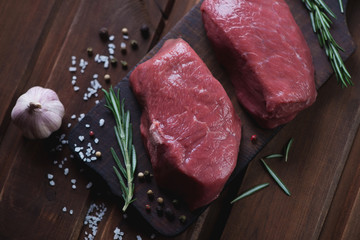 Above view of raw asado marbled beef steaks, selective focus