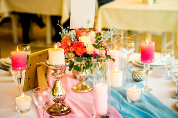 Table decoration with flowers and candle