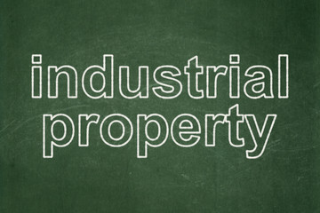 Law concept: Industrial Property on chalkboard background