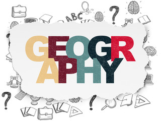 Fototapeta na wymiar Studying concept: Geography on Torn Paper background