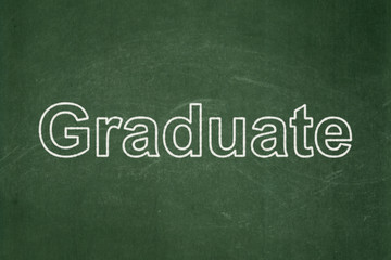 Fototapeta premium Education concept: Graduate on chalkboard background