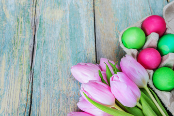 Obraz na płótnie Canvas Easter composition with eggs and tulips
