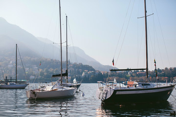 yacht in a mountain lake Como