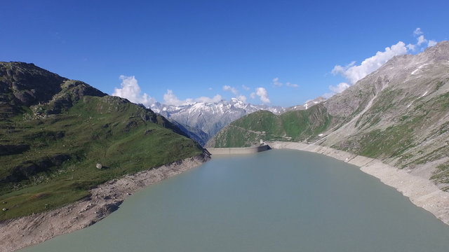 Aerial Footage of the Oberaar dam in the alps in Switzerland, 4K, UHD