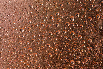 Fresh Water Drops dew on copper alloy texture surface showing fr