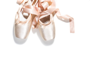 Pink ballet shoes isolated