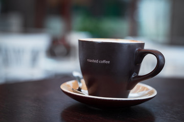 Cup of roasted coffee