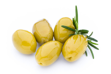 Olives on leaves isolated on white.
