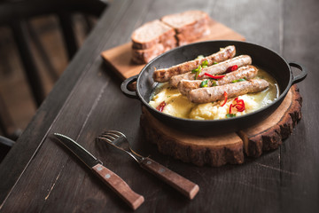 mashed potatoes with sausages grilled