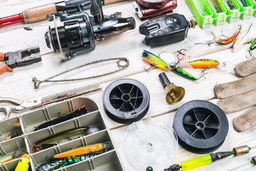 Various fisherman's equipment on wooden background © fotofabrika