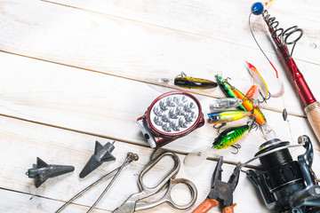 Various fisherman's equipment on wooden background © fotofabrika
