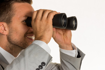 Manager mit Fernglas