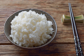 Bowl of Organic White Rice with chop sticks
