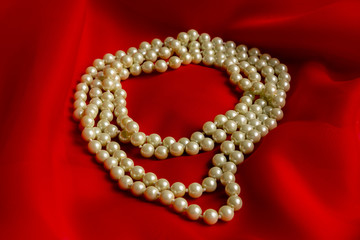 White Pearl Necklace with a red soft silk