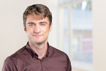 Obraz premium Young handsome man smiling