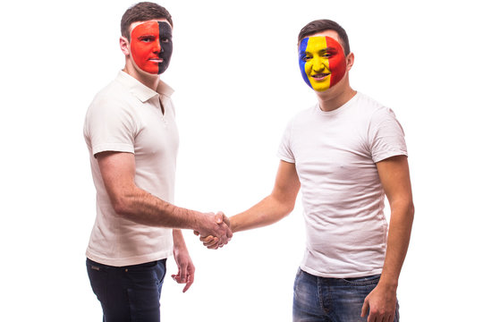 Albania vs Romania. Football fans of national teams friendly handshake before match on white background. European 2016 football fans concept.
