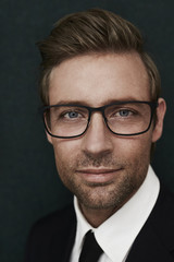 Businessman in glasses, portrait