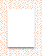 Close-up of one nailed blank frame on orange dots background