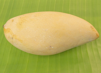 mango on banana leaf