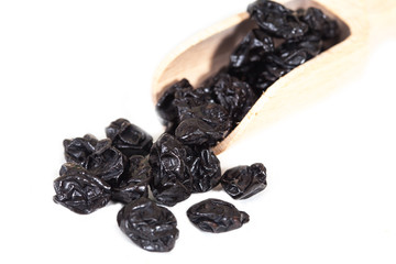 Dried raisins on a white background
