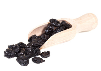 Dried raisins on a white background