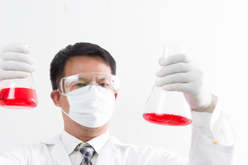 liquid dripping from pipette into test tube