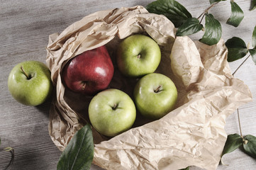 various apples on a wooden tabletop