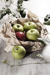 various apples on a wooden tabletop