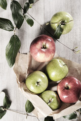 various apples on a wooden tabletop