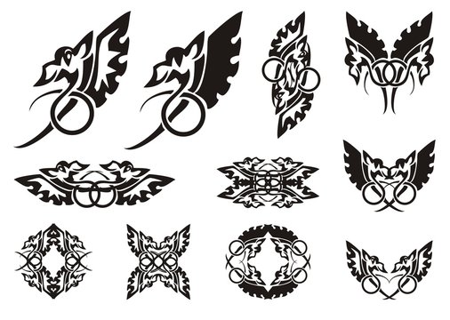 Twirled dragon symbols. Winged amusing dragon with the tail twirled in a ring, frames and symbols from him