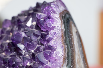 Amethyst druse over agate rock