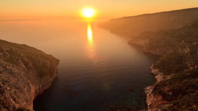 Beautiful full HD timelapse video of a summer sunset of the rocky coast of the island of Zakynthos, Greece. 