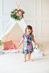 Little girl with wigwam