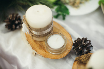 candles and pine cone Rustic