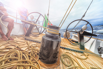 Sailing boat winch with rope and man