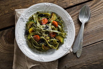 Pasta with zucchini cherry tomatoes and cheese