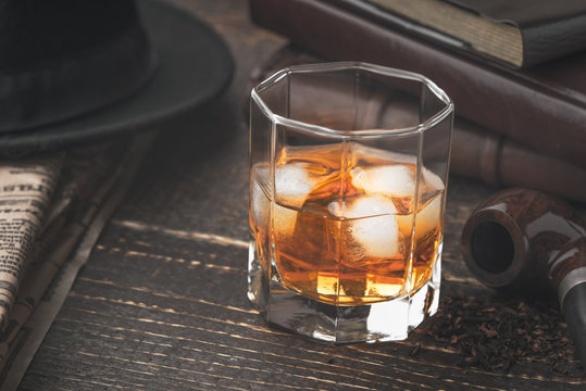 Whiskey with ice and different accessories horizontal