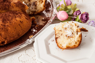 Slice of Easter Dove on a white dish.
