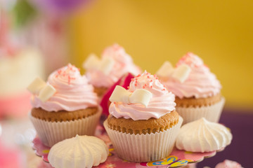 close-up of pink cupcake with icing