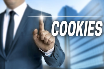 cookies touchscreen is operated by businessman