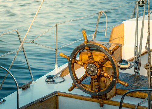 Steering wheel on the yacht.