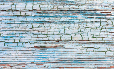 Texture of the cyan ink as a background The surface with peeling old paint. 