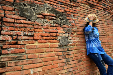 Thai woman portrait at ancient building at Wat Mahathat