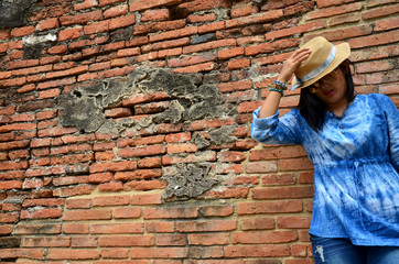 Thai woman portrait at ancient building at Wat Mahathat