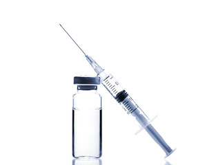 Glass Medicine Vial and Syringe on white background