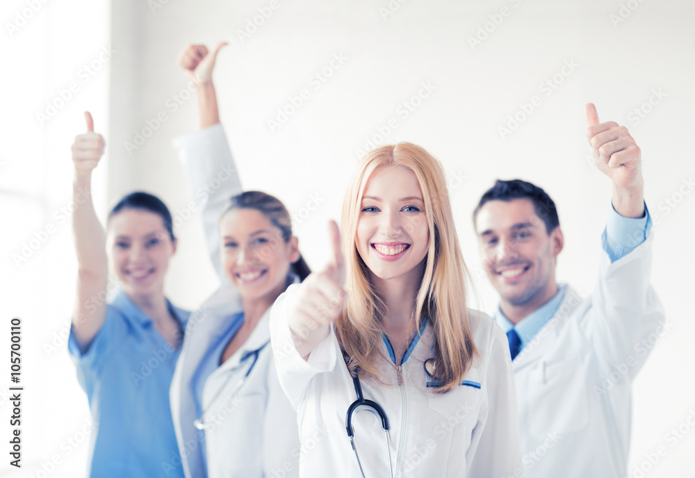 Wall mural group of doctors showing thumbs up