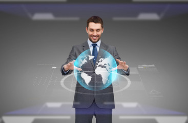 businessman with virtual earth globe projection