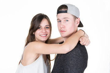 Beautiful young couple in casual clothing on white