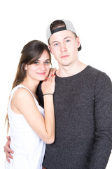 Loving couple leaning against each other isolated